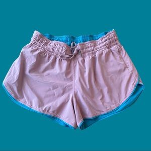 LULULEMON Choose a Side Short Sz8 Reversible 3" Zip Pocket Teal/mauve